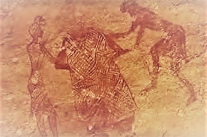 Pintura rupestre en la meseta del Tasili en Argelia, probablemente data de hace 15,000 años, sin embargo, se puede ver la vestimenta con retazos de hilado.